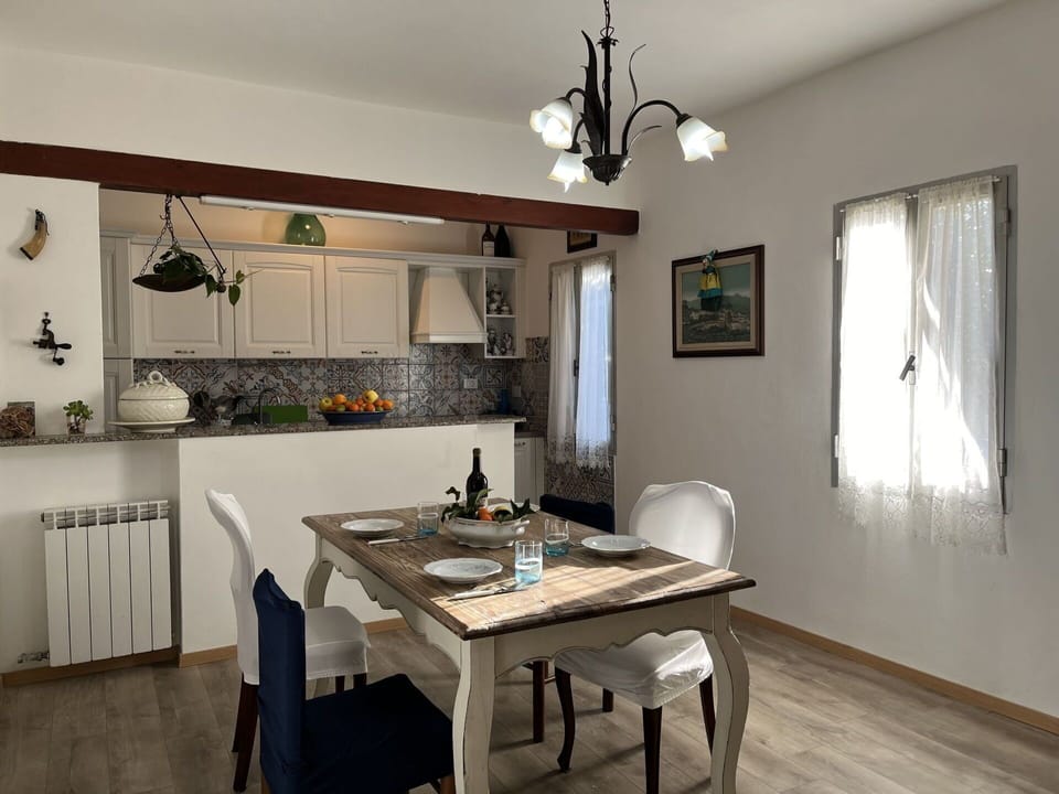 Property, Cabinetry, Table, Window, Countertop, Lighting, Wood, Interior Design, Kitchen, Floor