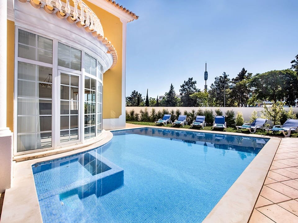 Water, Plant, Sky, Property, Swimming Pool, Azure, Outdoor Furniture, Shade, House, Tree