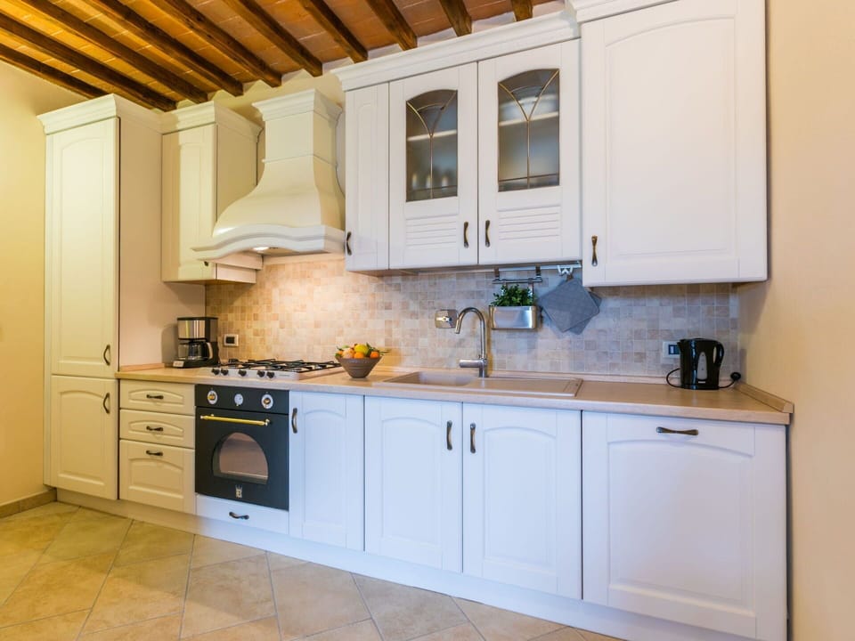 Cabinetry, Countertop, Building, Kitchen Sink, Sink, Kitchen Appliance, Kitchen Stove, Home Appliance, Kitchen, Wood