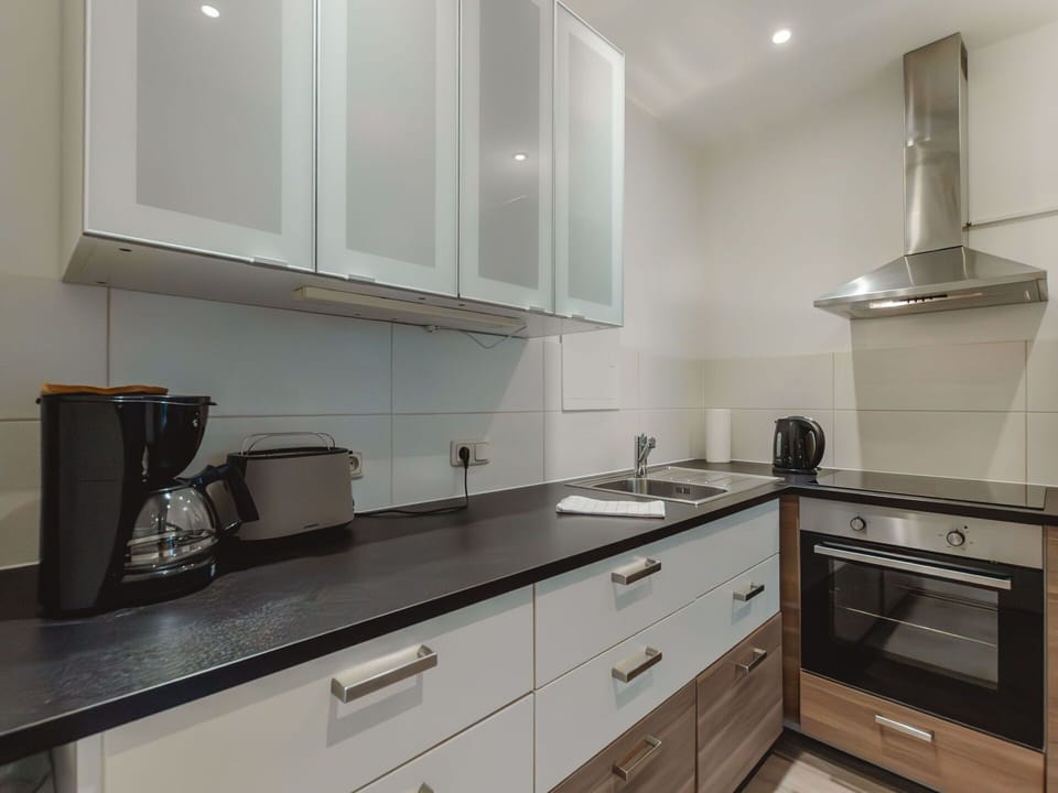 Cabinetry, Countertop, Property, Building, Kitchen, Kitchen Stove, Interior Design, Drawer, Kitchen Appliance