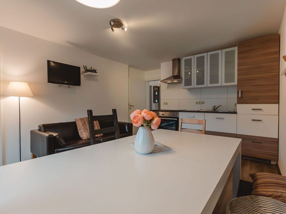 Furniture, Table, Cabinetry, Countertop, Building, Lighting, Chair, Wood, Interior Design, Floor