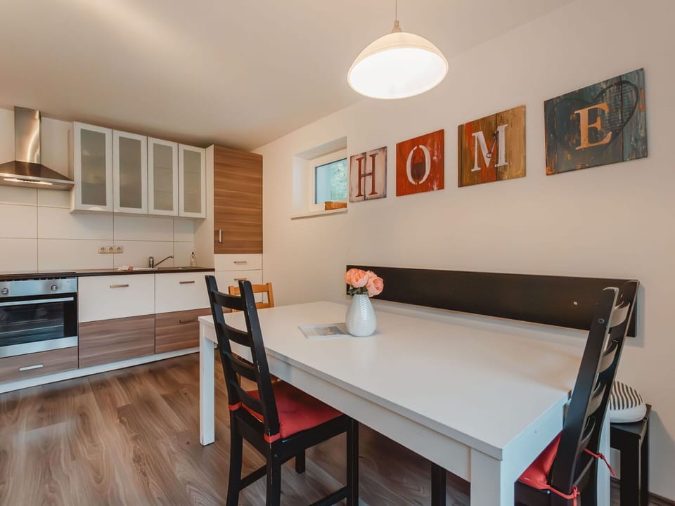 Property, Furniture, Cabinetry, Table, Countertop, Kitchen Appliance, Wood, Lighting, Interior Design, Chair