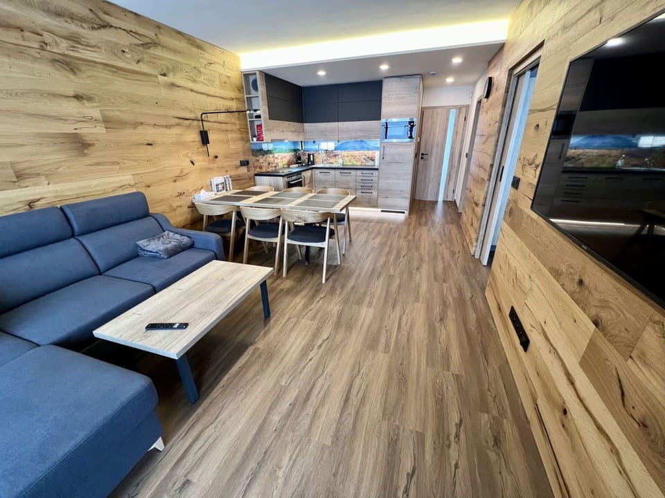 Table, Property, Furniture, Couch, Wood, Interior Design, Floor, Television, Flooring, Studio Couch
