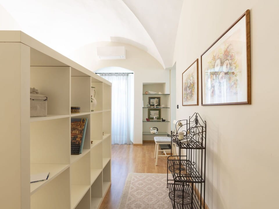 Furniture, Picture Frame, Cabinetry, Wood, Hall, Interior Design, Flooring, Floor, Shelving, Hardwood