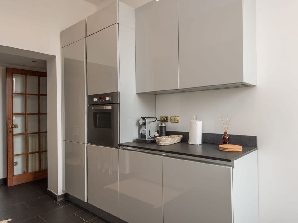 Cabinetry, Countertop, Kitchen Appliance, Wood, Kitchen, House, Interior Design, Kitchen Stove, Home Appliance