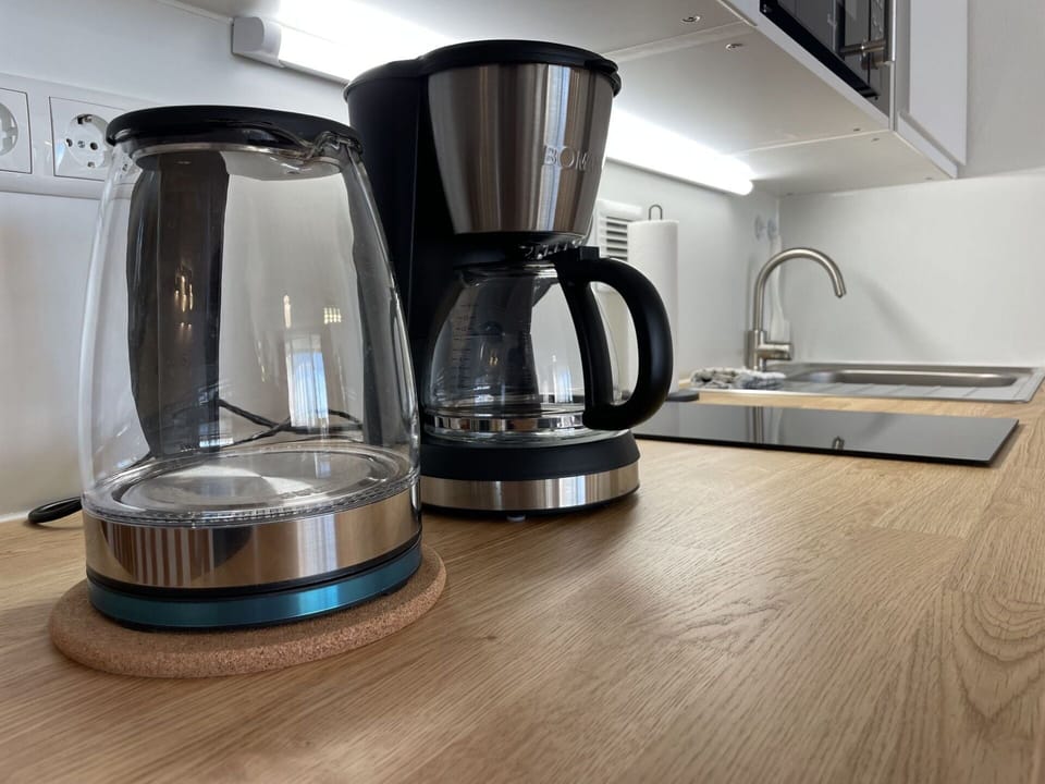 Countertop, Kitchen Appliance, Drinkware, Kitchen Sink, Home Appliance, Sink, Lighting, Kitchen, Tap, Tableware