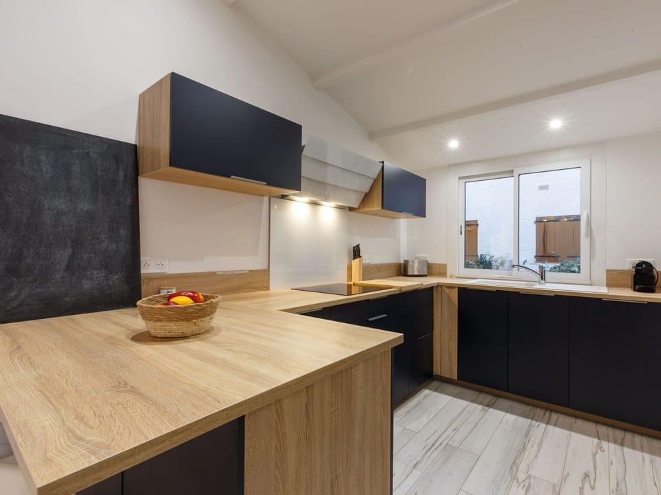 Cabinetry, Countertop, Furniture, Tap, Table, Sink, Kitchen, Wood, Interior Design, Lighting
