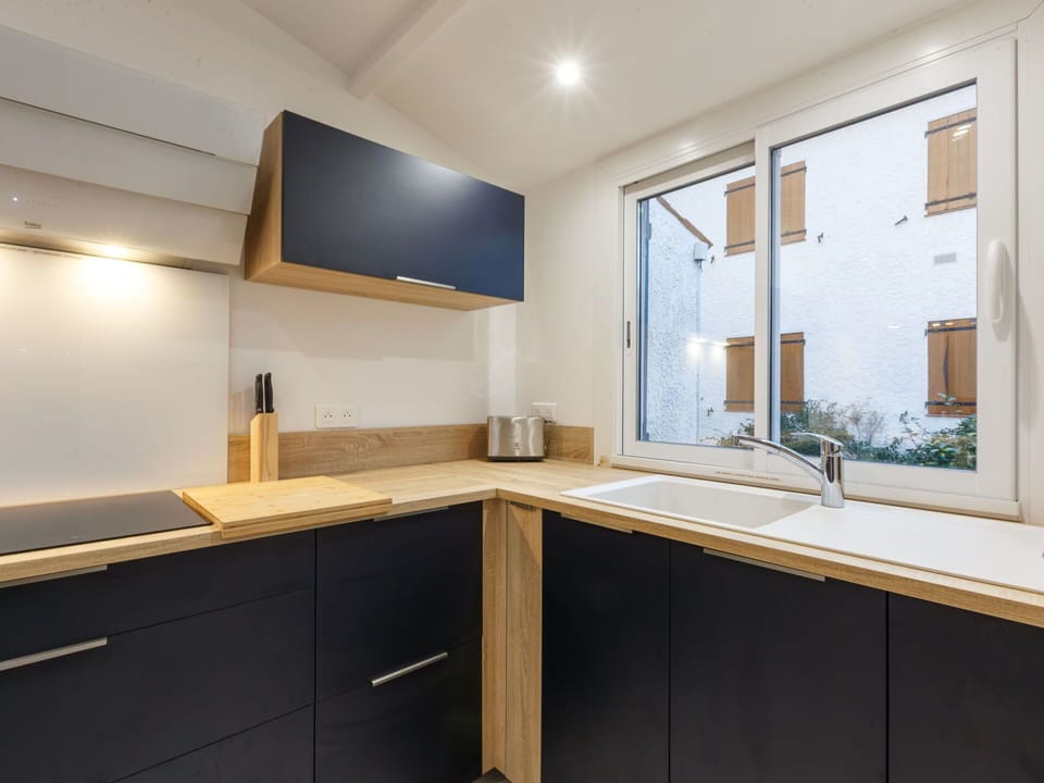 Cabinetry, Countertop, Tap, Property, Plant, Sink, Kitchen, Plumbing Fixture, Wood, Window