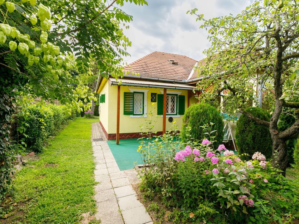 Plant, Building, Flower, Property, Window, Nature, Natural Landscape, House, Tree, Sky