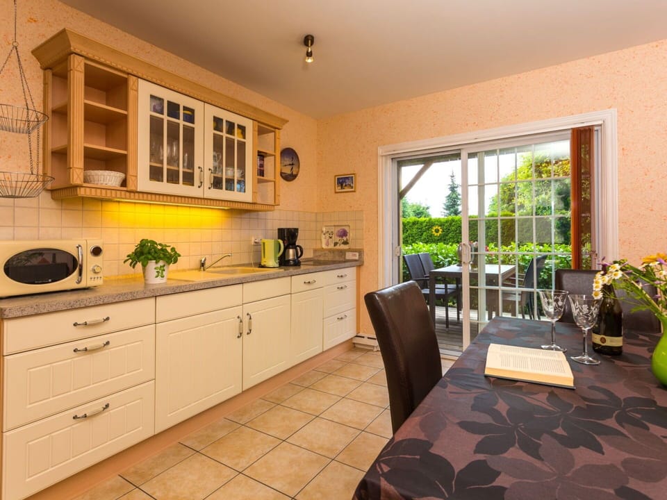 Cabinetry, Furniture, Plant, Countertop, Window, Tap, Chair, Houseplant, Wood, Kitchen