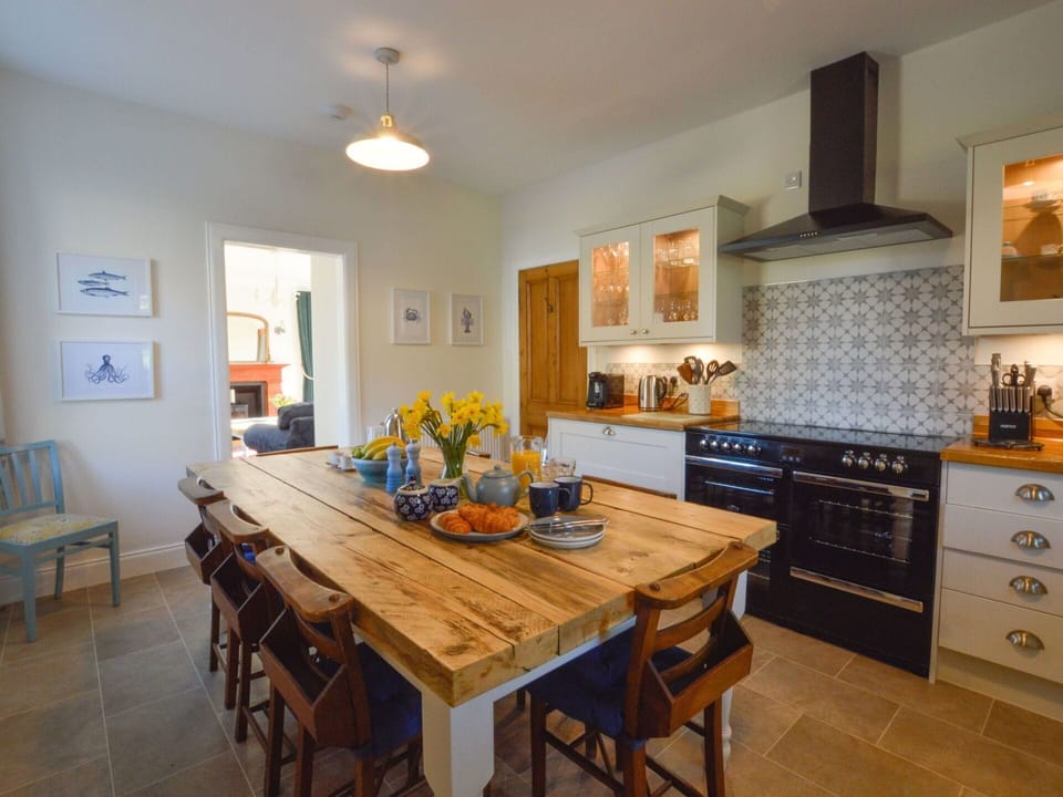 Table, Furniture, Cabinetry, Property, Picture Frame, Chair, Blue, Countertop, Wood, Lighting