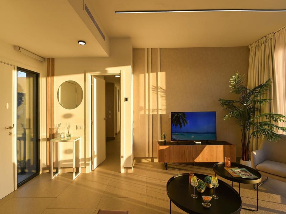 Couch, Building, Door, Houseplant, Wood, Plant, Lighting, Comfort, Interior Design, Flooring