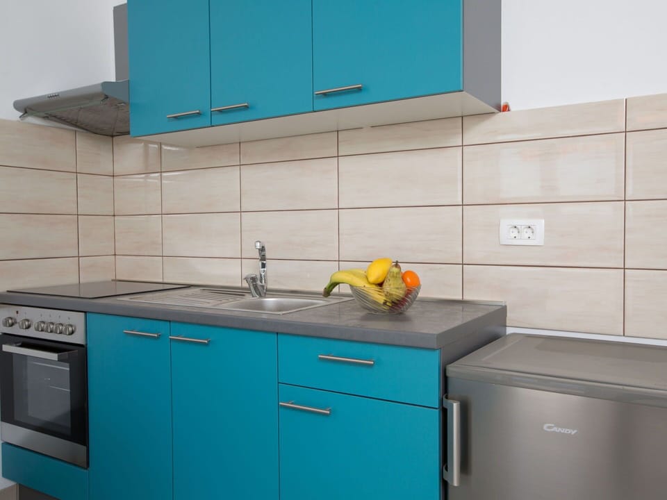 Cabinetry, Property, Kitchen Sink, Blue, Countertop, Tap, Product, Azure, Sink, Drawer