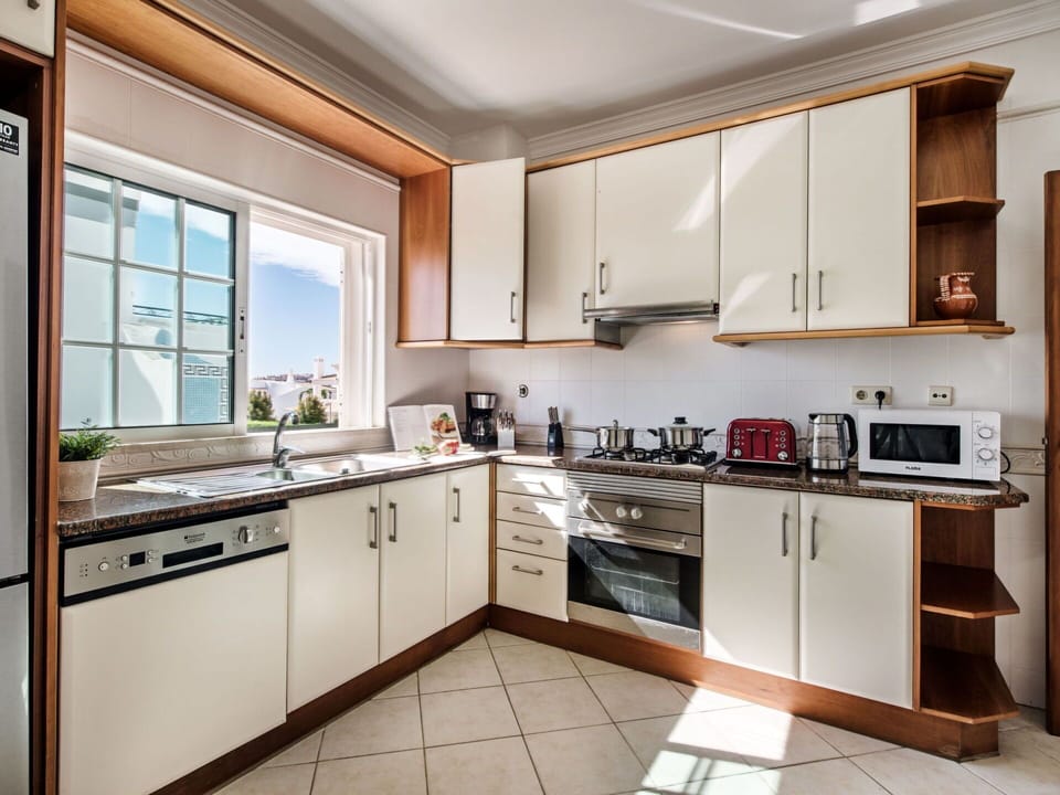 Cabinetry, Property, Countertop, Kitchen Stove, Sink, Window, Kitchen Appliance, Kitchen, Home Appliance, Kitchen Sink