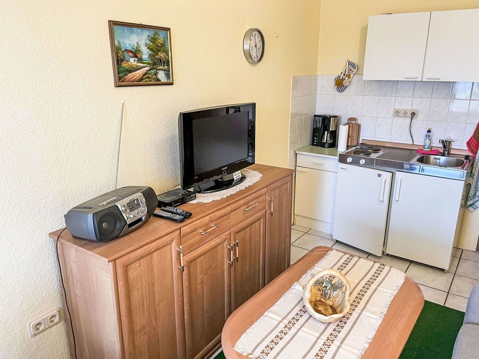 Cabinetry, Property, Furniture, Table, Interior Design, Drawer, Home Appliance, Picture Frame, Sink, Television