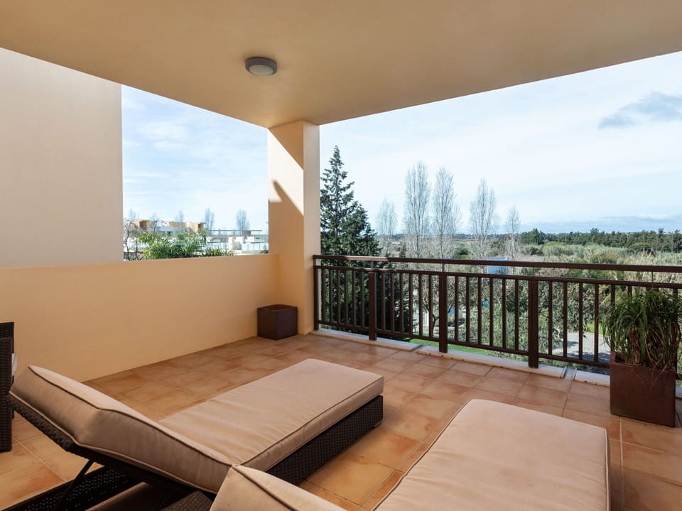 Plant, Sky, Building, Water, Property, Azure, Shade, Umbrella, Outdoor Furniture, Interior Design