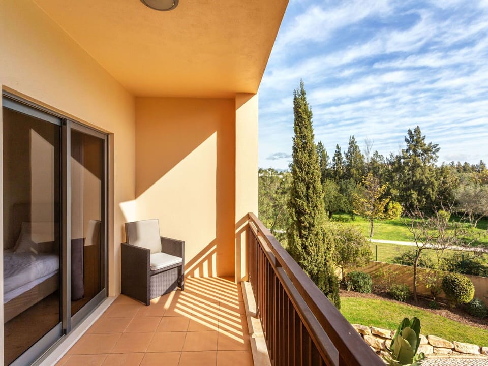 Plant, Sky, Building, Water, Property, Azure, Shade, Umbrella, Outdoor Furniture, Interior Design