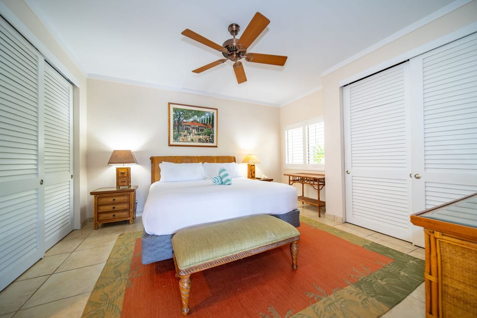 Unwind in crisp linens with island-inspired, calming decor.