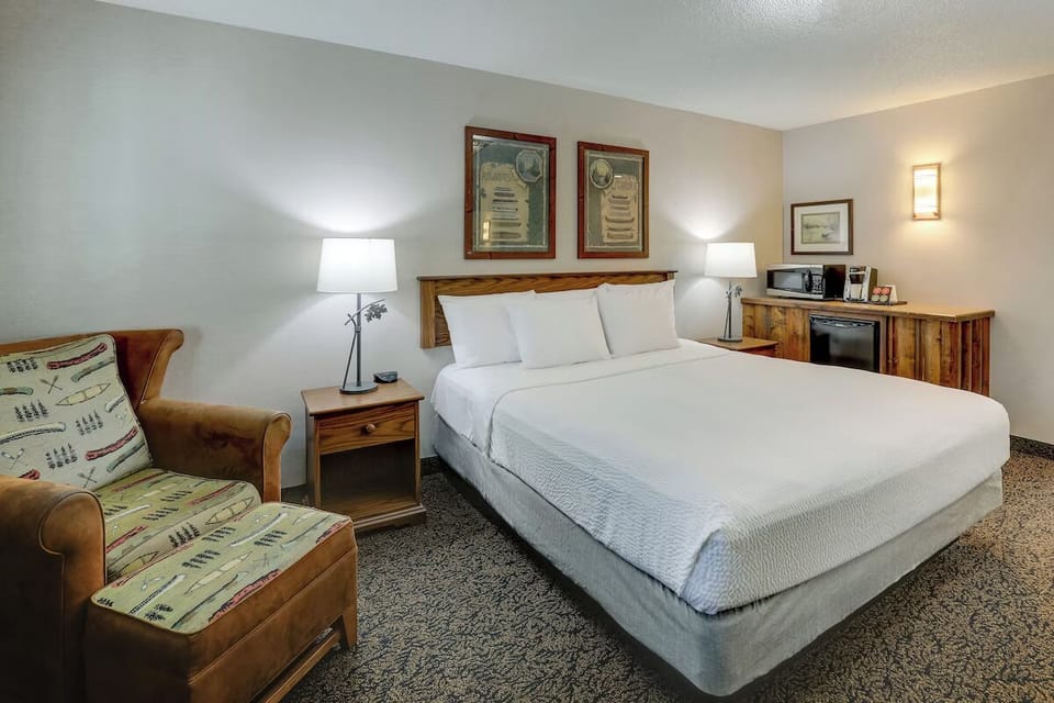 Sink into crisp linens and relax in the reading chair.