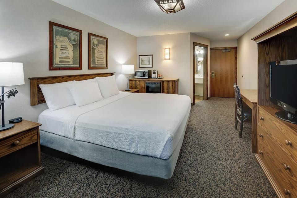 Unwind in a cozy king room with work desk.