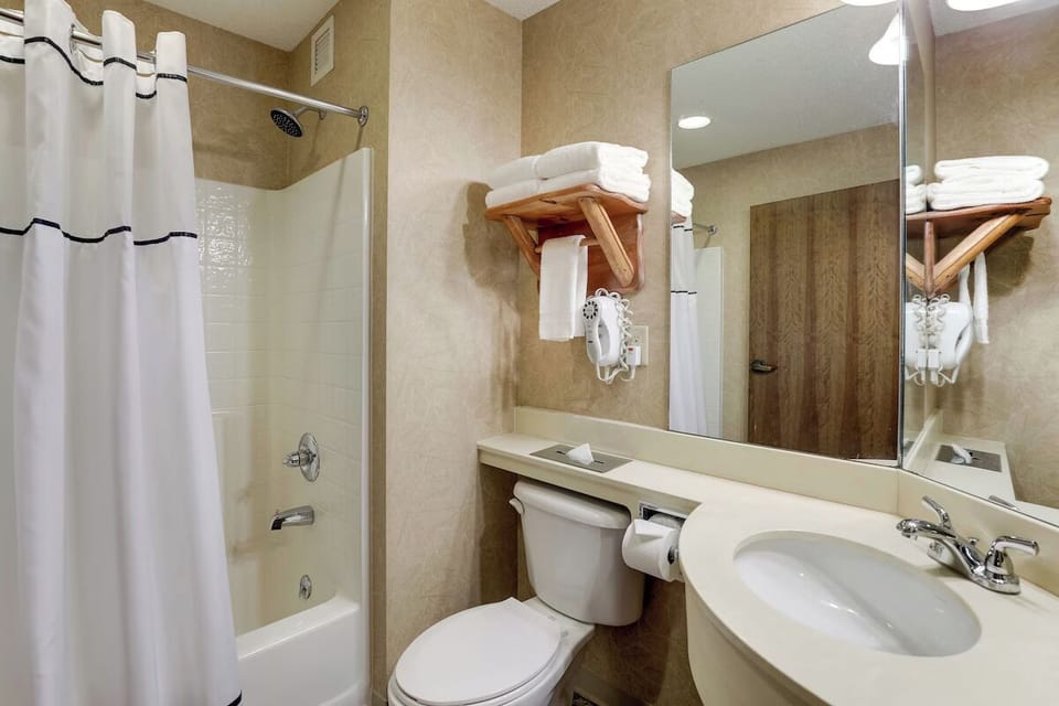 Refresh under a hot shower with plush towels ready.
