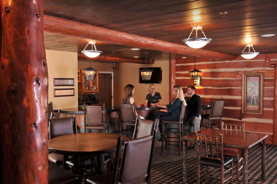 Gather at the rustic bar for relaxed drinks and conversation.