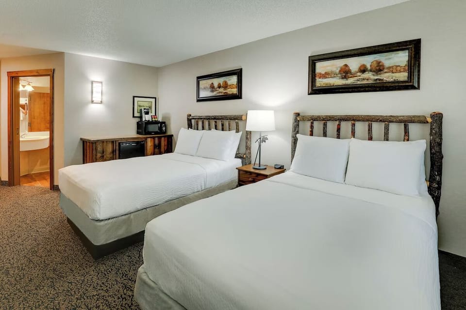 Wake up to coffee steps away, with bath access nearby.