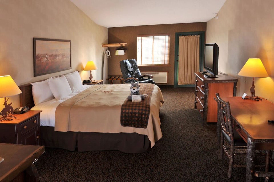 Recharge in a warm, quiet room with desk and TV.