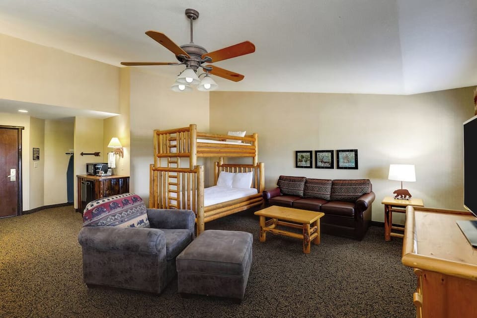 Gather with family in a roomy suite with bunks.