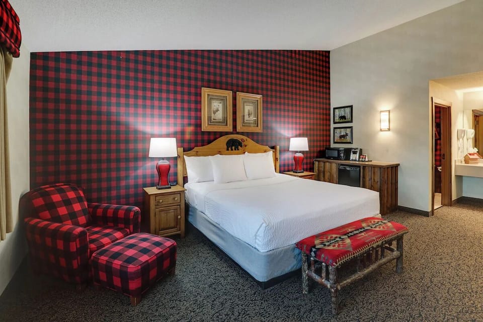 Recharge in a calm bedroom setting with warm cabin accents.