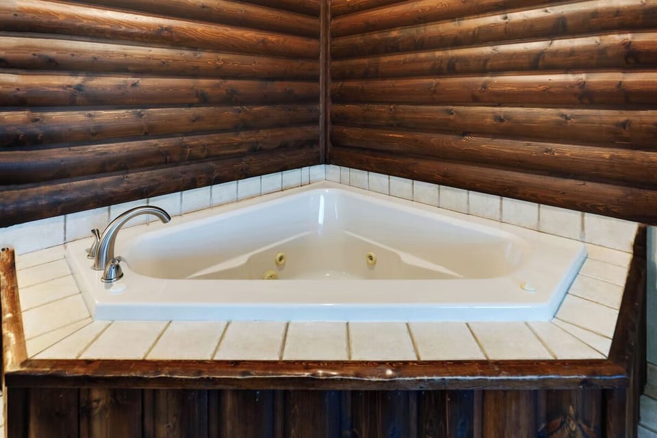 Soak in a private corner whirlpool after adventure-filled days.