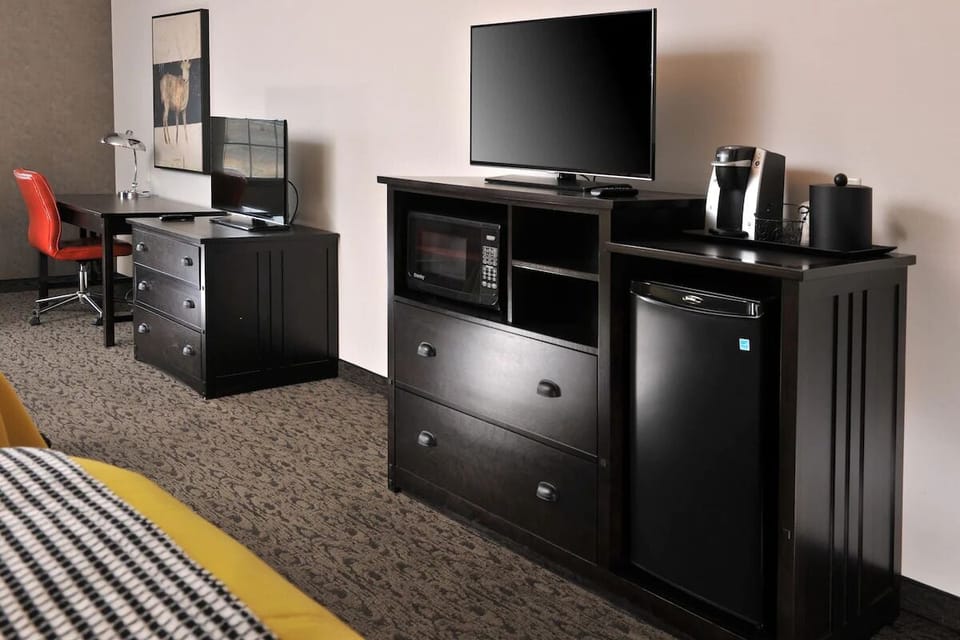 Enjoy movie nights with convenient storage and in-room snacks.