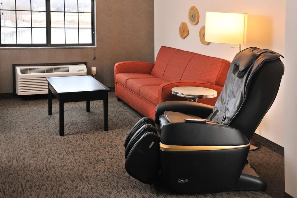Sink into the lounge area and enjoy a soothing massage chair.