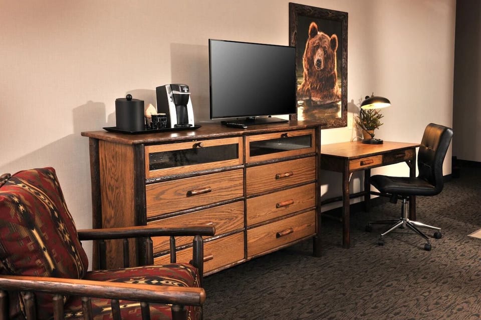 Settle in with coffee, streaming, and a dedicated work desk.
