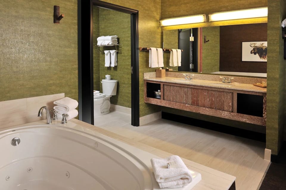 Indulge in a deep soaking tub and spa-like vanity.