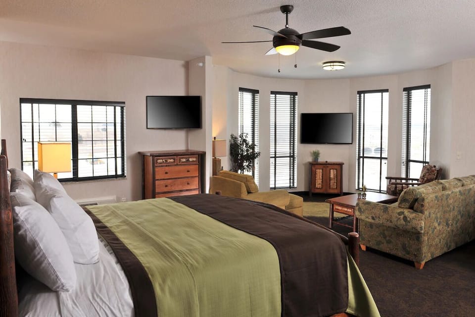Stretch out in a spacious bedroom with sunny corner seating.