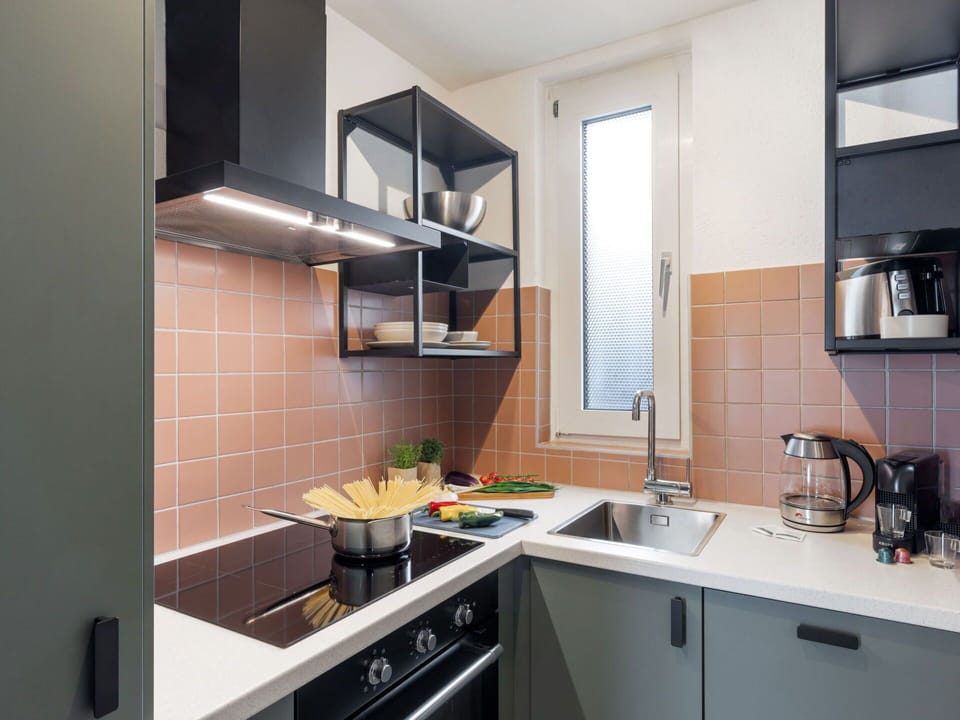 Tap, Kitchen Sink, Cabinetry, Countertop, Sink, Plumbing Fixture, Building, Kitchen Stove, Kitchen, Kitchen Appliance