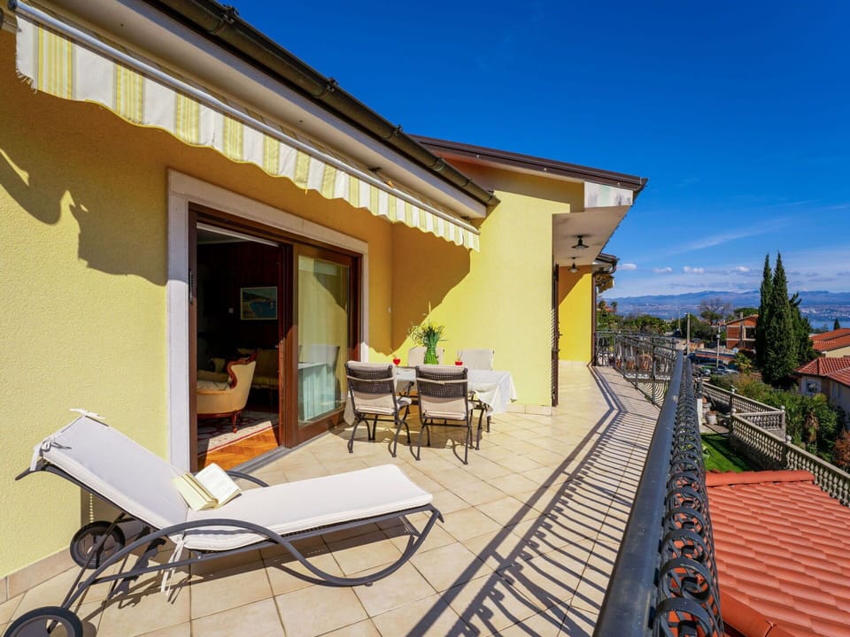 Sky, Property, Furniture, Building, Shade, Wood, Outdoor Furniture, Neighbourhood, Leisure, Chair