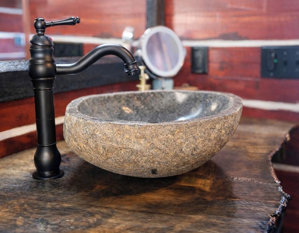 Special details throughout cabin, including stone sink. Lighted makeup mirror