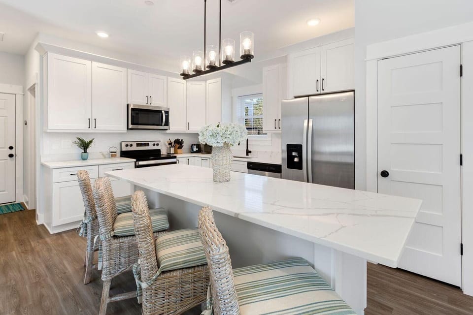 Whip up something delicious in the open-concept Kitchen with modern appliances.