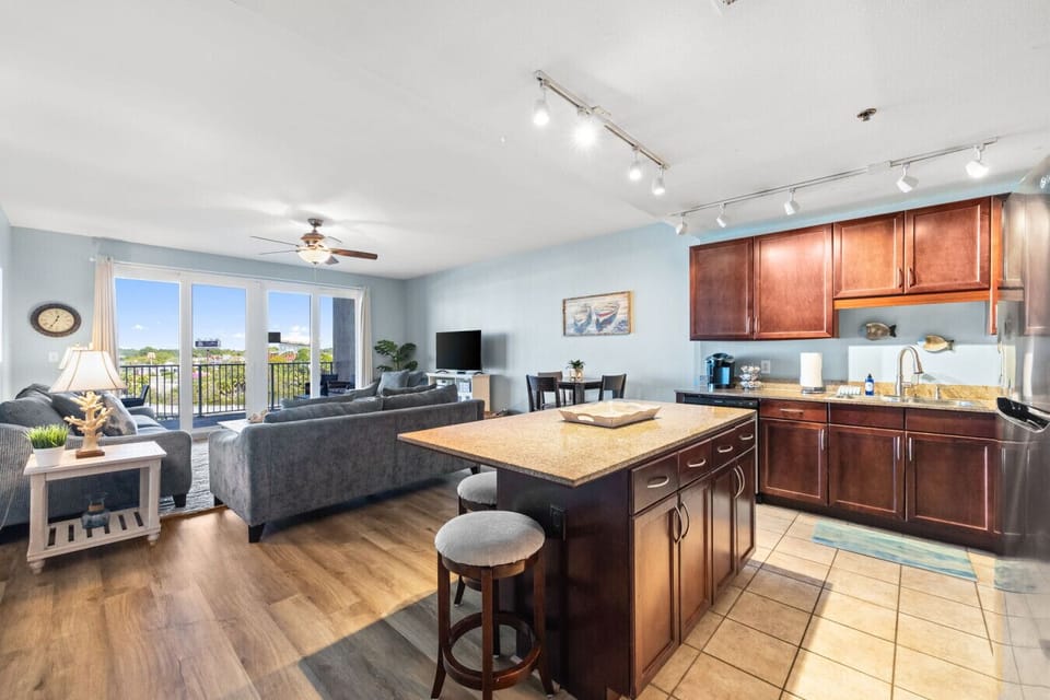 Fully Stocked Kitchen with Stainless Steel Appliances, Keurig Coffee Maker and Island Bar Seating