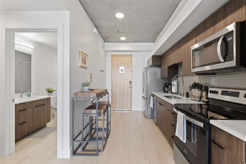 All the necessary tools for cooking are at your fingertips in this fully stocked kitchen.