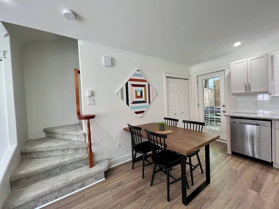 Delight in every detail of this inviting open-plan space—featuring a stylish dining area, sleek kitchen, and a seamless transition to outdoor relaxation!