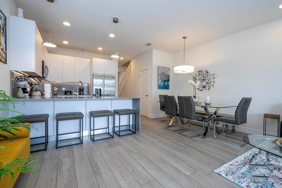 Picture yourself stepping into a contemporary kitchen—a harmonious blend of style and functionalit. Imagine gathering around th This space isn’t just a vacation rental; it’s a home away from home, promising comfort, sophistication, and memorable moments. Bon appétit!