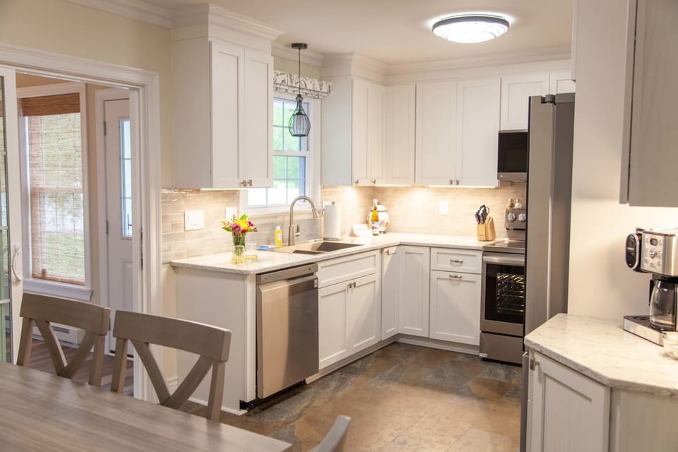 Bright eat-in kitchen – Fully stocked with everything you need to cook or gather.