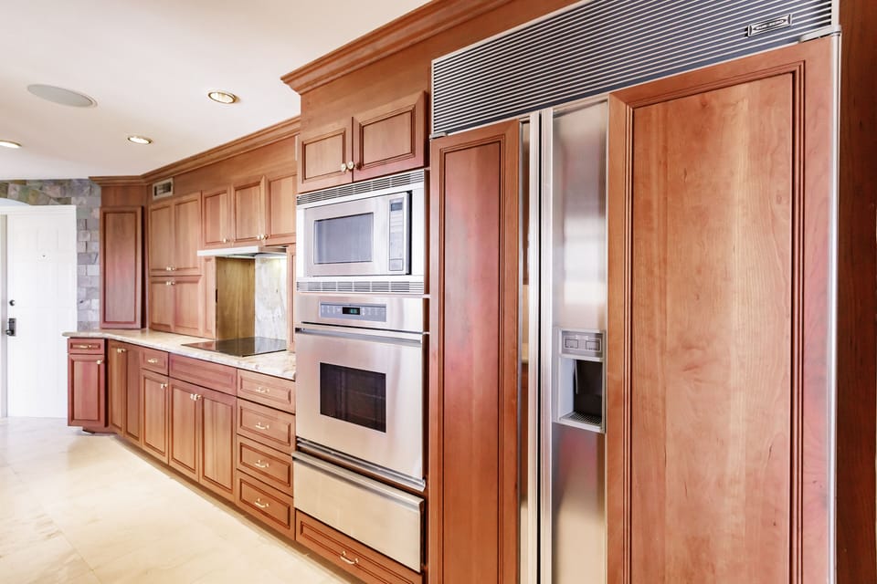 Thermador oven, microwave, warmer, side by side frig/freezer with ice maker