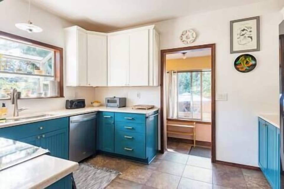 Kitchen leads to pantry and backdoor