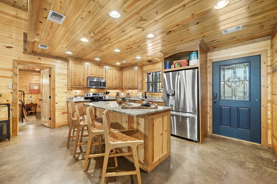 Barstool seating for 4 at the kitchen island supplements dining seat and provides a great spot for breakfast, hot beverages, snacks, or lunch.
