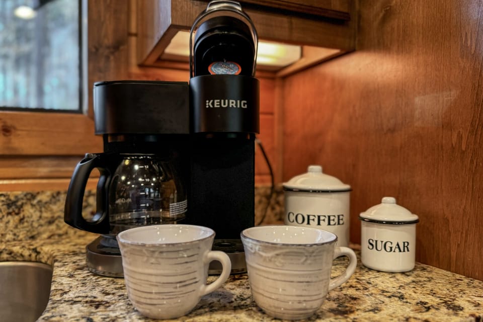 Grab your morning coffee from the Keurig or drip coffeemaker with complimentary coffee supplies.