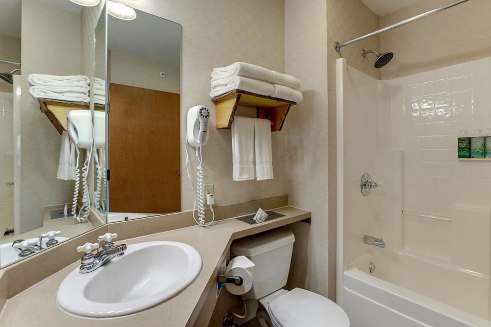 Refresh easily with a bright vanity and shower-tub combo.